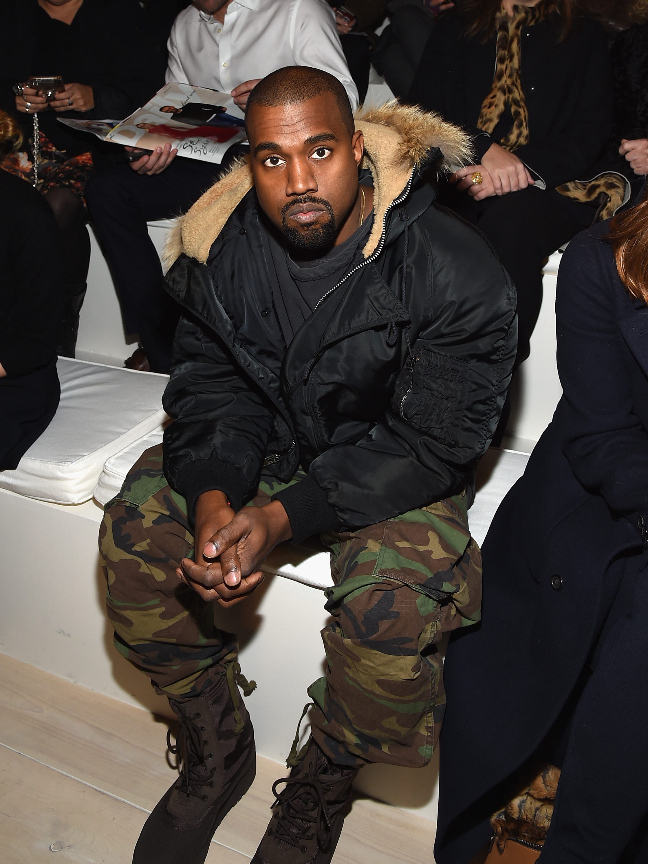 Kanye looks downright giddy at Ralph Lauren