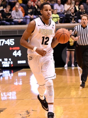 Dec 22, 2014; West Lafayette, IN, USA;  Purdue Boilermakers forward Vince Edwards (12) brings the ball up the court in the second half at Mackey Arena. Gardner-Webb defeated Purdue 89-84.Mandatory Credit: Sandra Dukes-USA TODAY Sports