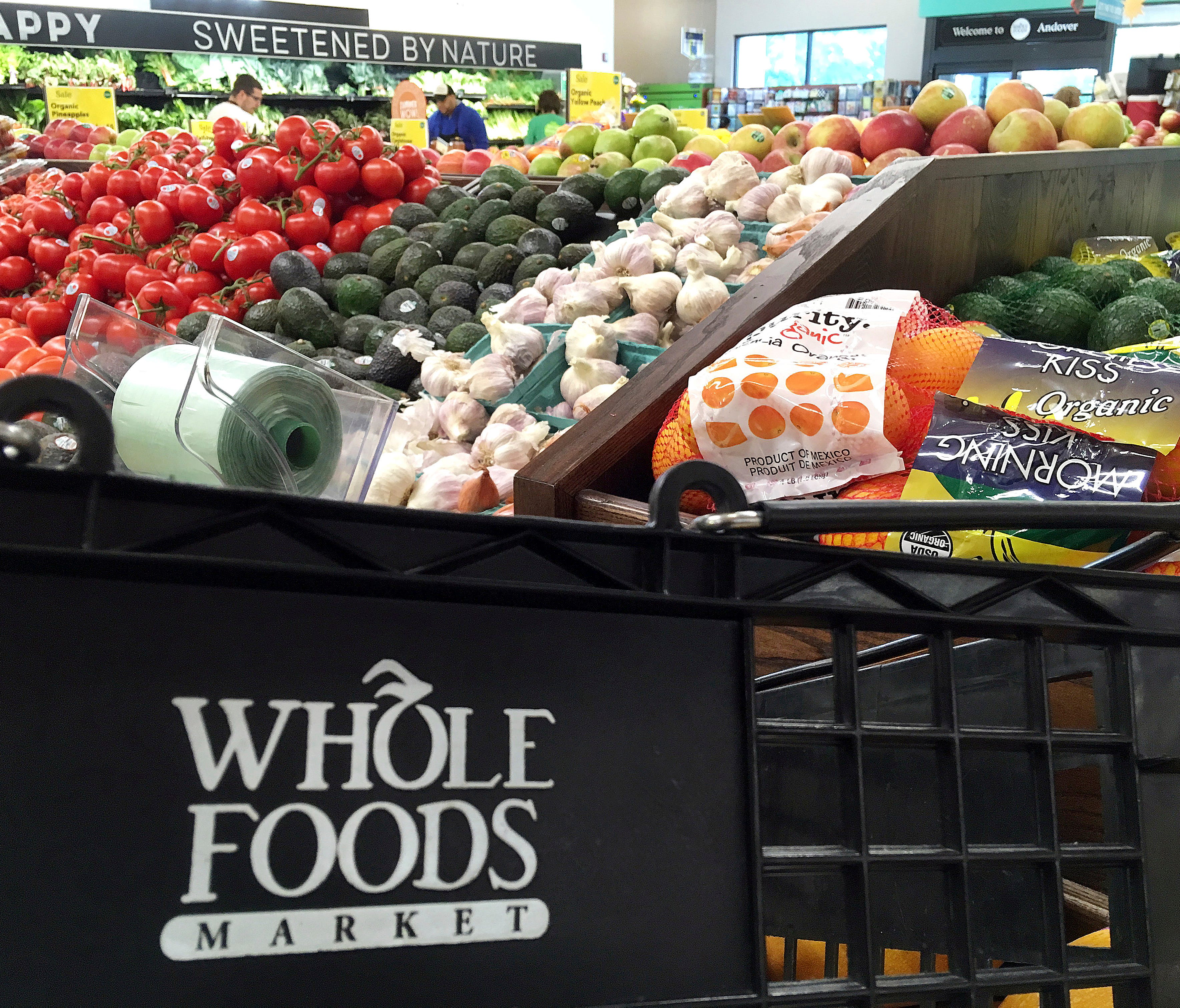 Amazon has announced it'll lower prices on select Whole Foods merchandise, starting Monday.