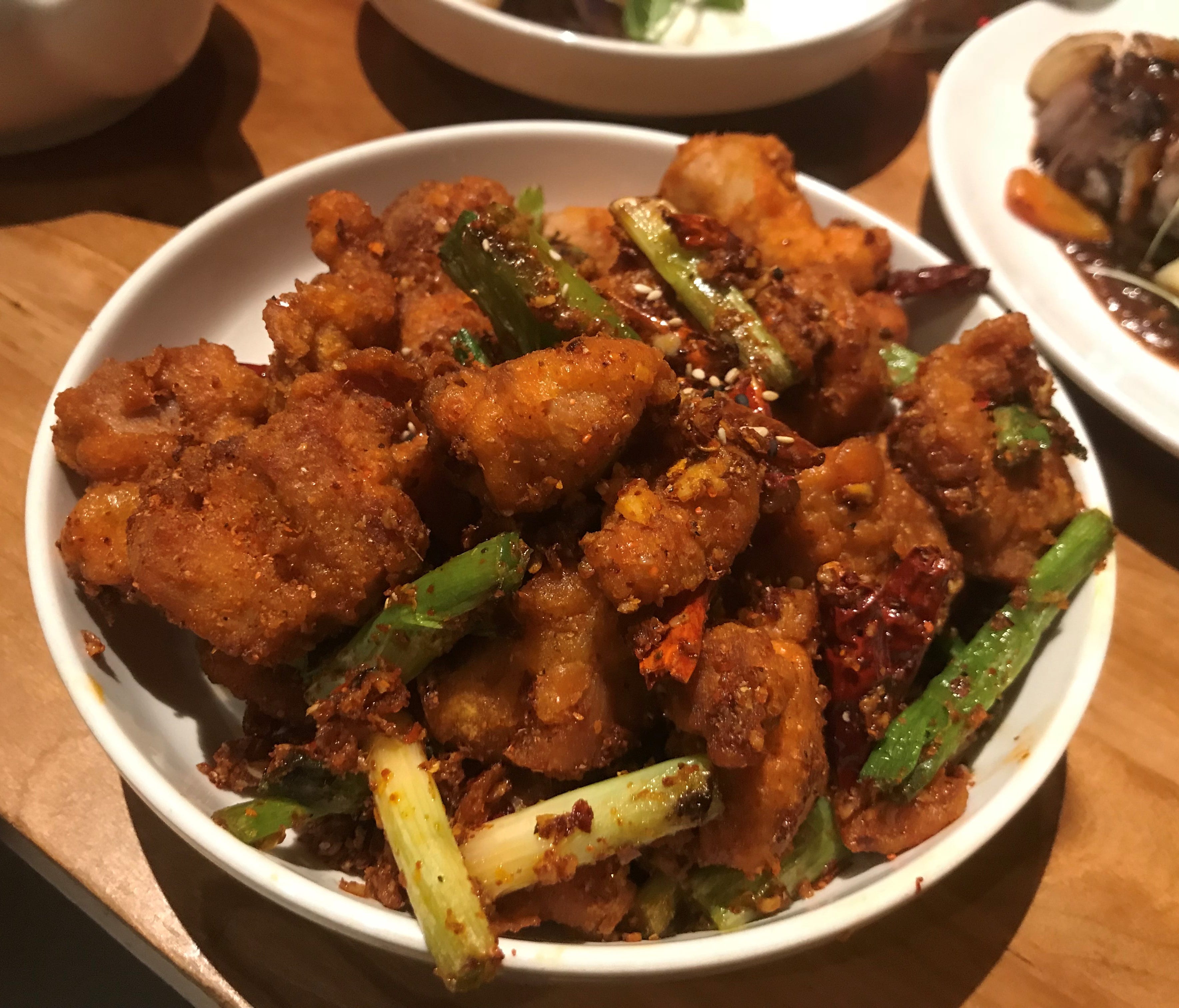The star of the show here is the La Zi Jim, fried chicken, which is very spicy, and very addictive. It is boneless chunks of fried chicken with dried chilies and Sichuan pepper, and once you start it is hard to stop. Like most entrees here, it is ser