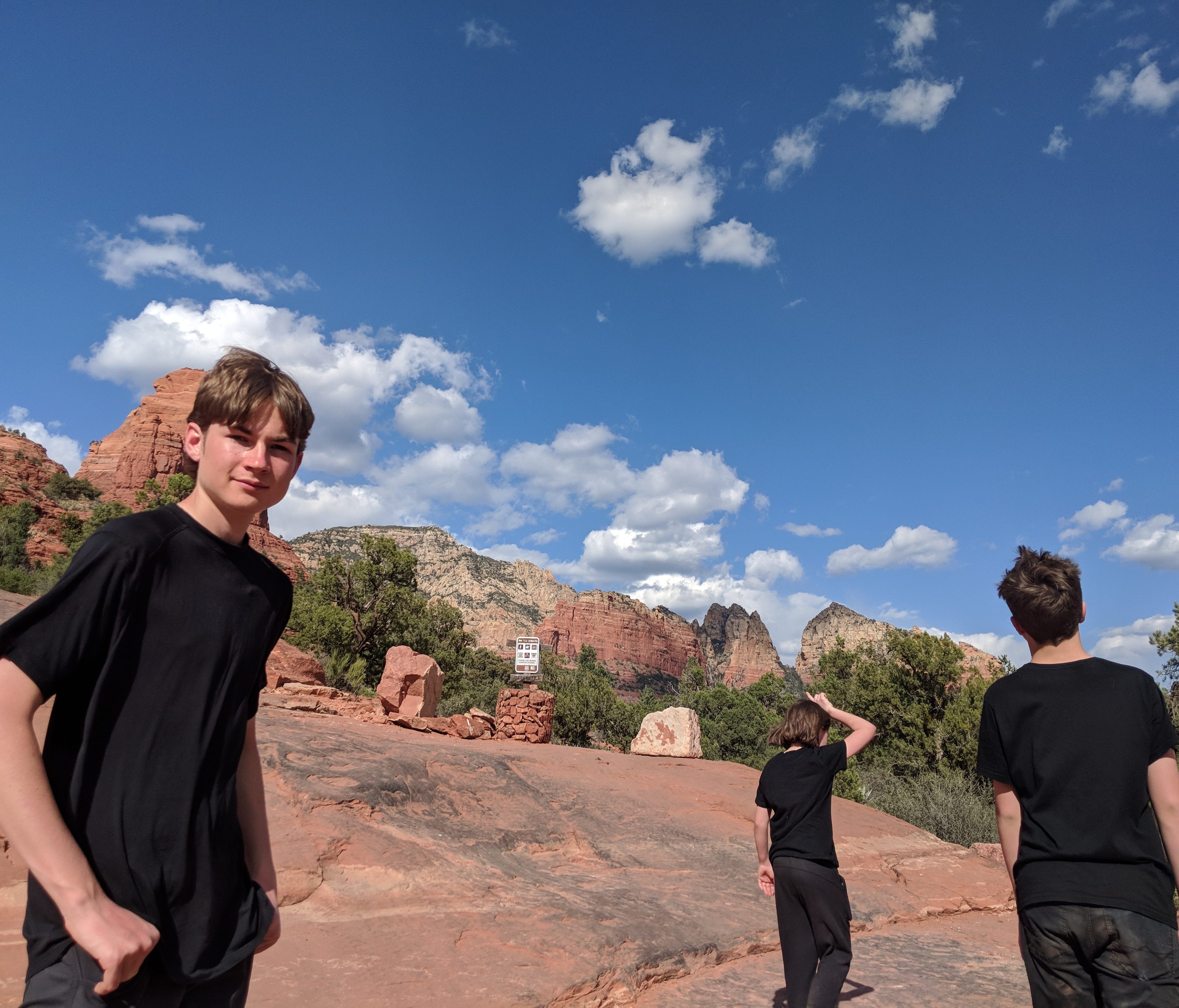 Aren Elliott and his siblings, Erysse and Iden, at Soldier Pass Trail in Sedona, Ariz. If you plan your hike right, you can avoid the crowds.