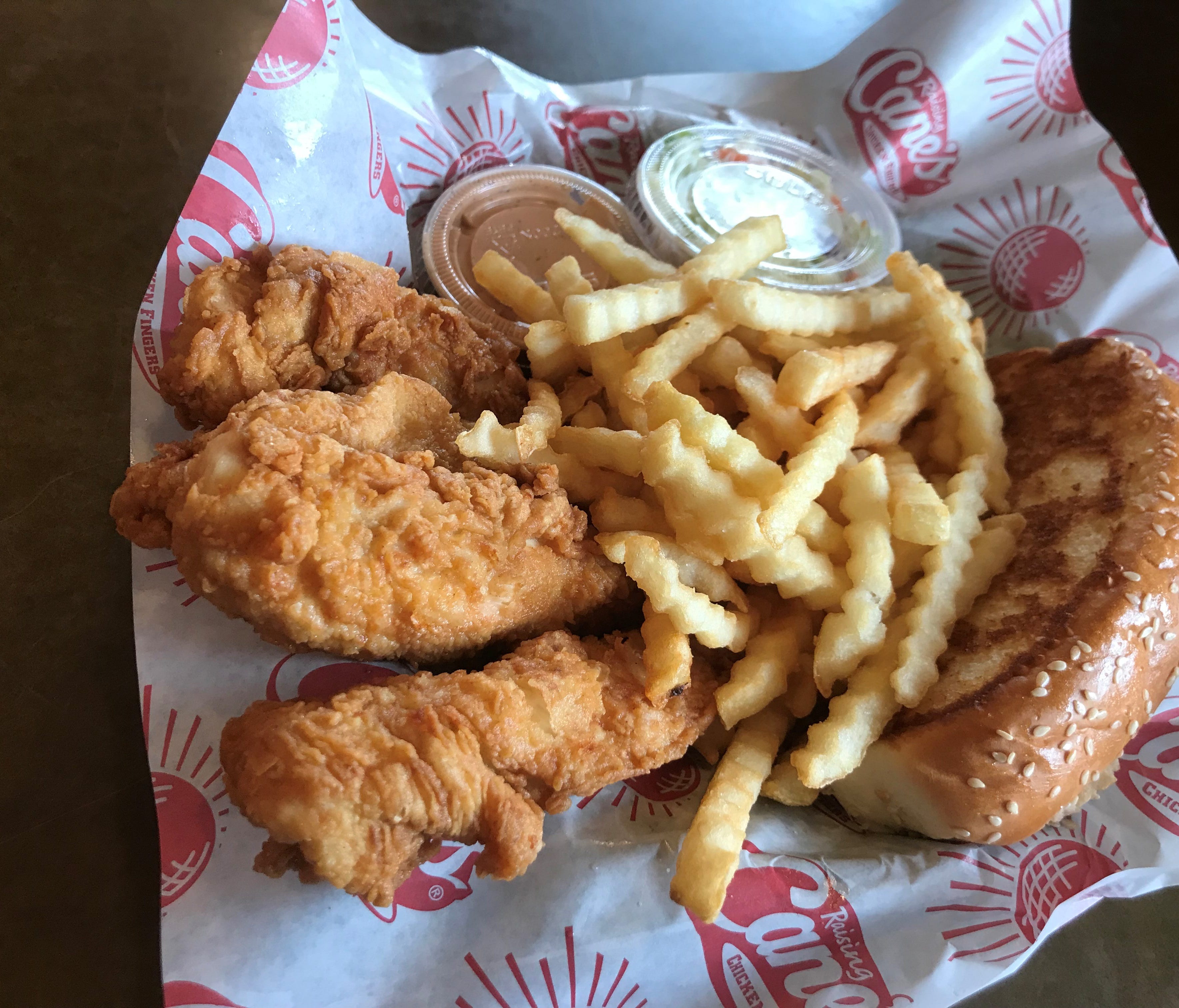 Chicken fingers are the main event – and the only event – at Raising Cane's, a chain built entirely around this one humble dish. The most popular entrée, the Box Combo, features four tenders with Cane's Sauce for dipping, cole slaw, crinkle-cut fries