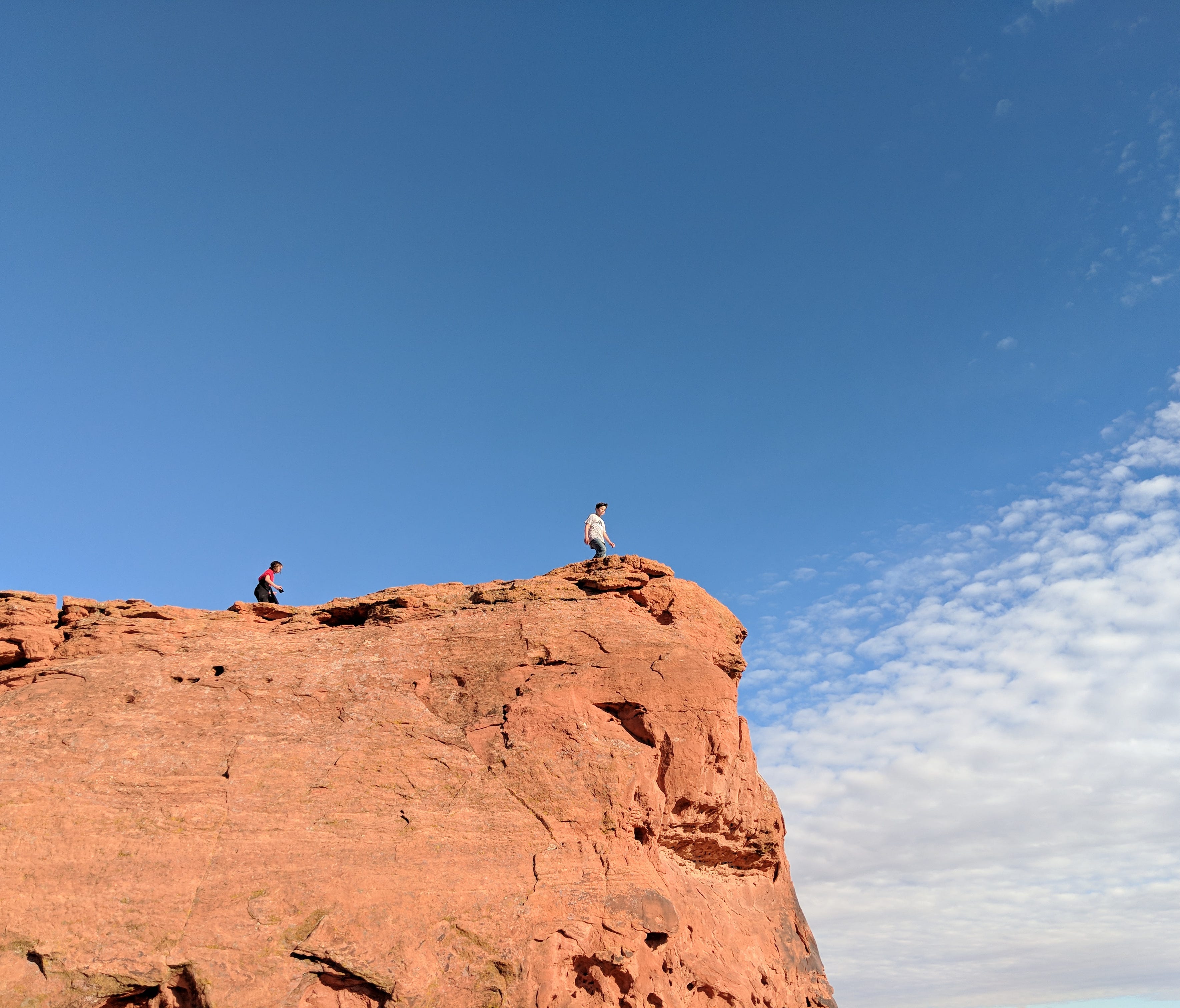 Erysse and Iden Elliott reach the summit at Red Cliffs National Conservation Area near St. George, Utah. National and state parks are always on the 