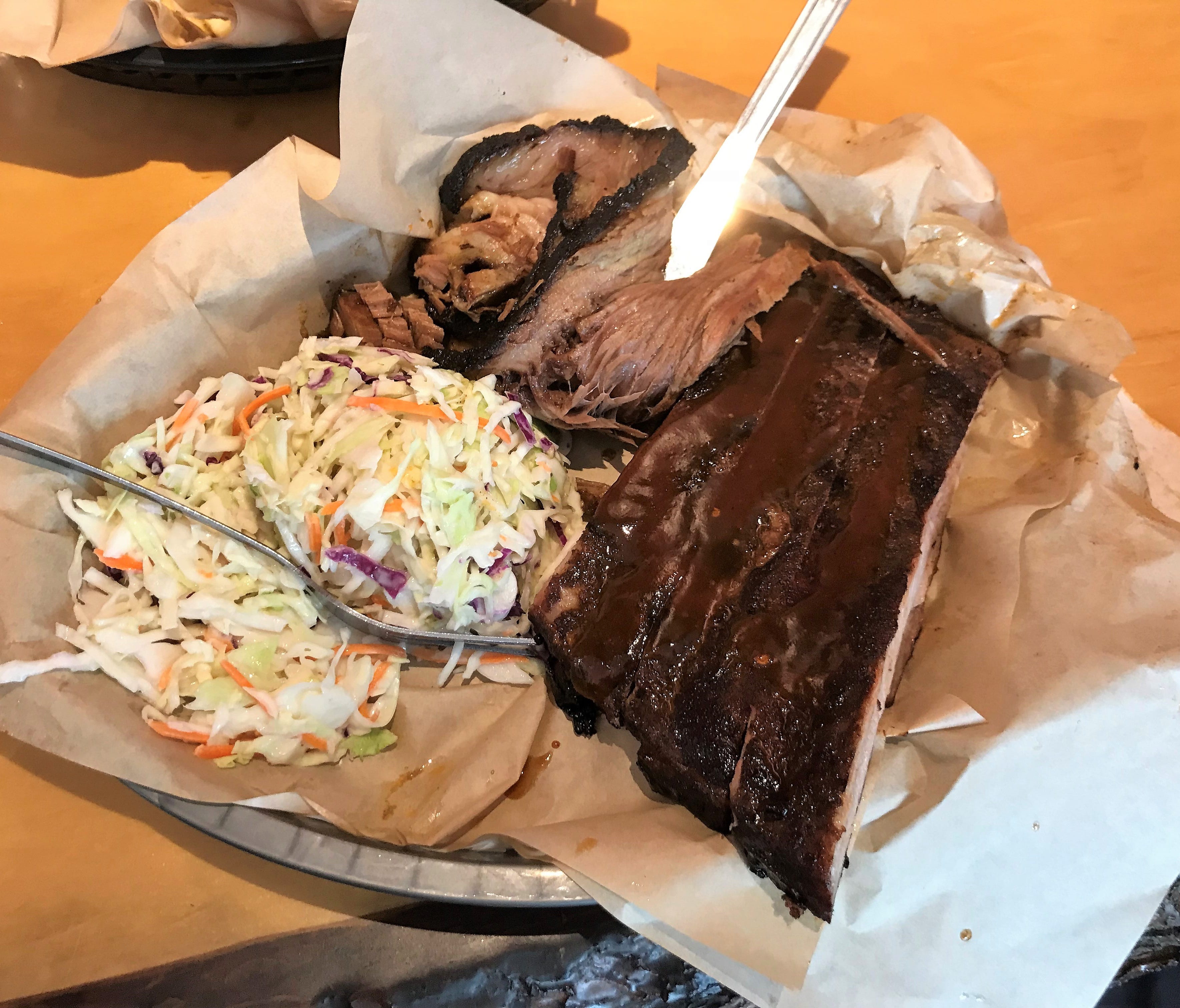 All of the barbecue meats are offered as two-option combo plates with cole slaw – this is quarter rack of ribs and 8 ounces of beef brisket.
