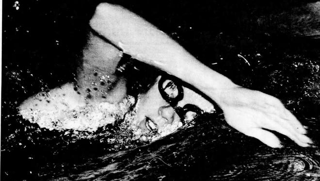 Amy (Dempsey) Karns swims for the Marshall High School girls swimming team in this 1990 photo. Karns has been selected as a member of the 2017 Albion College Athletic Hall of Fame Class.
