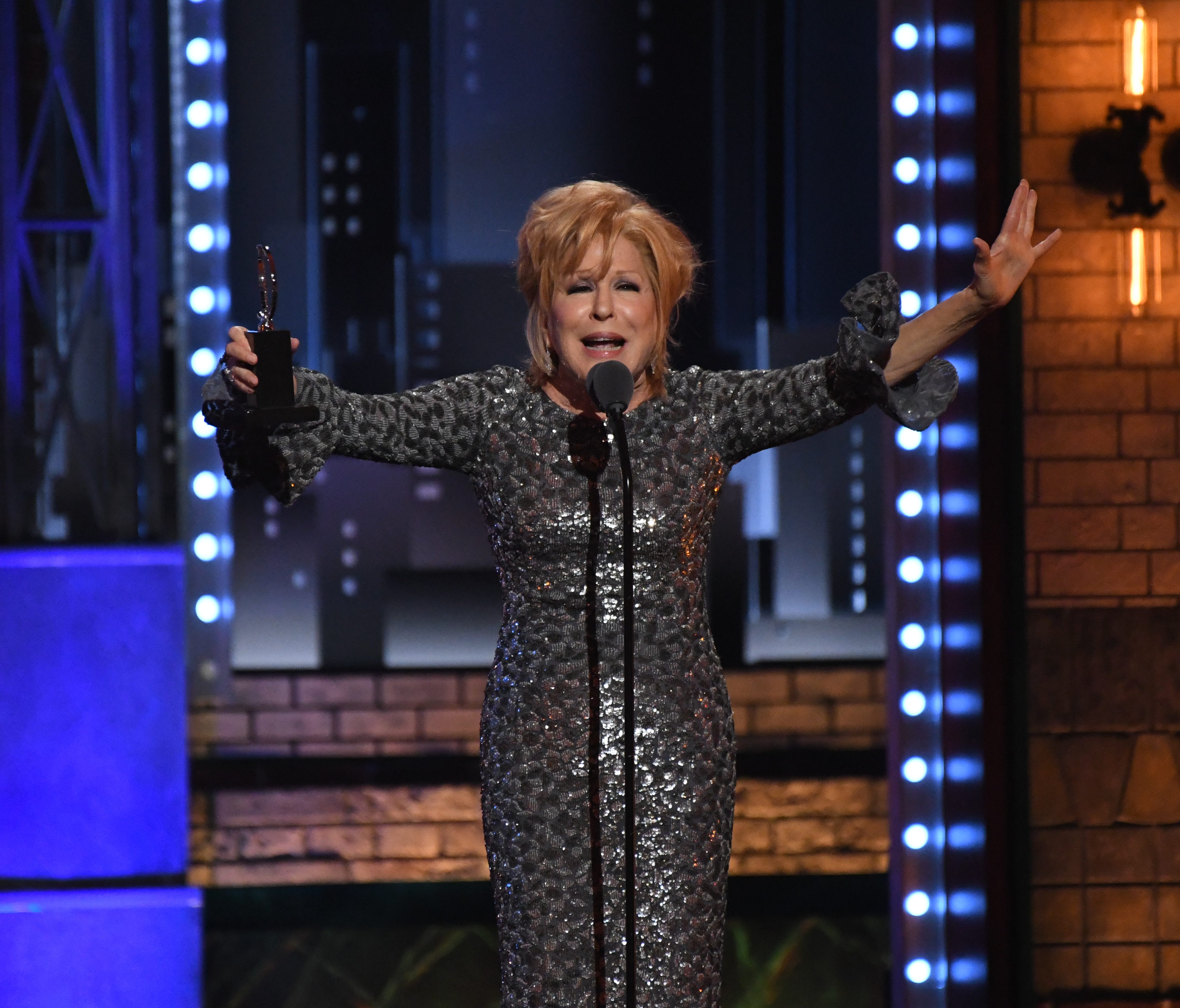 Bette Midler accepts the award for Leading Actress in a Musical for 'Hello, Dolly!' at the 71st Tony Awards at Radio City Music Hall Sunday night.