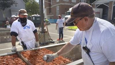 Rotary chicken BBQ – a recent event attended by Brad Westfall (left) and Jim Davison, a fall festival favorite. Dinner this year is Sunday, September 10 from 11am to 5pm (or while stocks last).