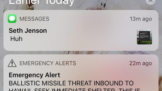 This smartphone screen capture shows a false incoming ballistic missile emergency alert sent from the Hawaii Emergency Management Agency system on Saturday, Jan. 13, 2018. (AP Photo/Marco Garcia)