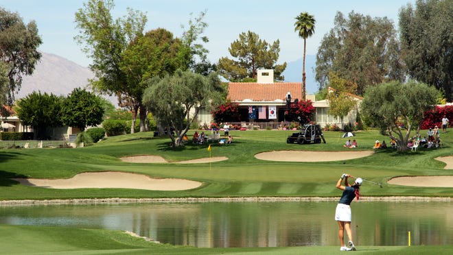 Coachella Valley golf courses, like the Mission Hills Country Club in Rancho Mirage, are among the biggest consumers of groundwater. But recent data shows that golf courses reduced potable water consumption by <252>40 percent, largely by switching to recycled water. <137>Michelle Wie hits across the water to the sixth green during the first day of the LPGA’s 2013 Kraft Nabisco Championship at Mission Hills Country Club in Rancho Mirage. Coachella Valley golf courses are among the top users of groundwater.<137>