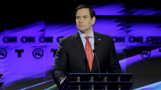 Republican presidential candidate, Sen. Marco Rubio, R-Fla., looks on during a Republican presidential primary debate at The University of Houston, Thursday, in Houston.