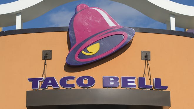 A Taco Bell fast food restaurant is seen in New Carrollton, Maryland, December 31, 2014. AFP PHOTO / SAUL LOEB        (Photo credit should read SAUL LOEB/AFP/Getty Images)
