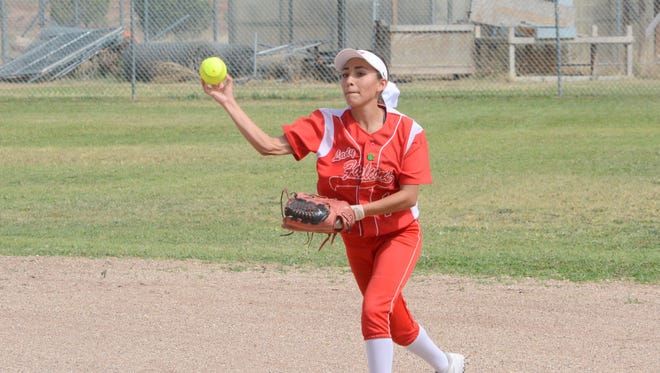 Loving's Leliana Rodriguez gets a put-out in game one Tuesday against Tularosa.