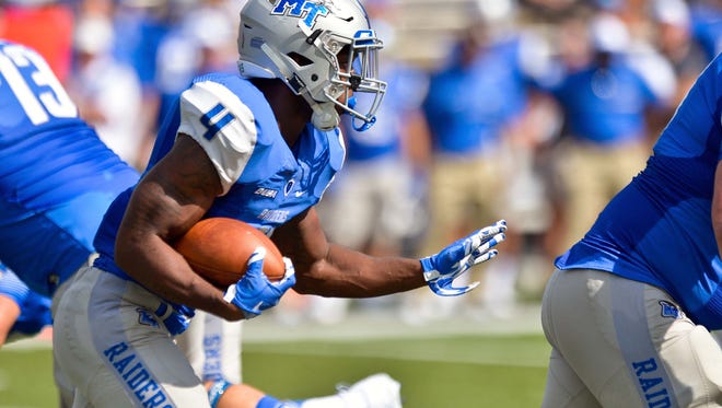 Middle Tennessee Blue Raiders running back I'Tavius Mathers (4) rushes against the Vanderbilt Commodores during the first half at Vanderbilt Stadium. Mandatory Credit: Jim Brown-USA TODAY Sports