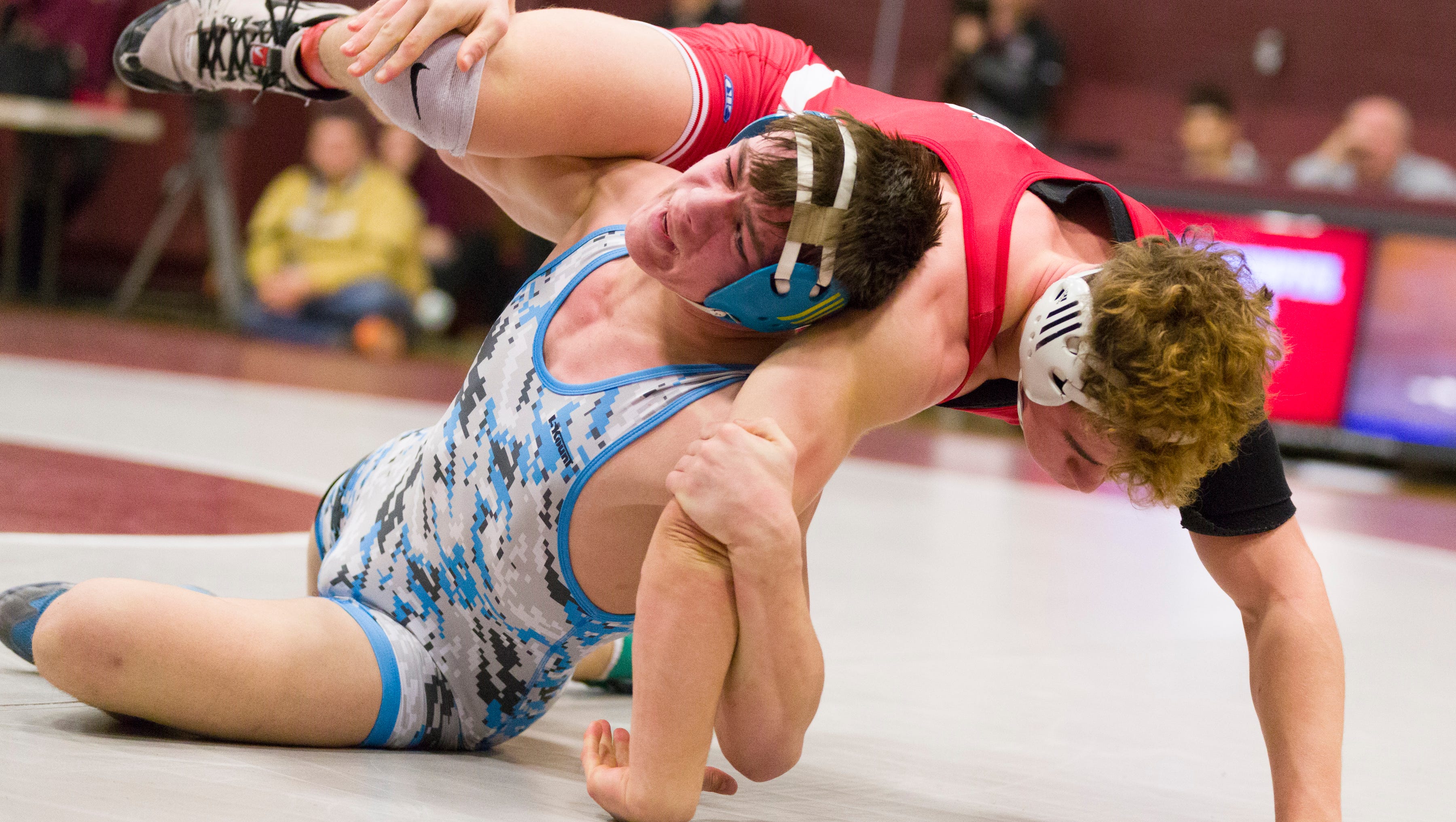 Wrestling Don Bosco's Swords wins district title in his first try