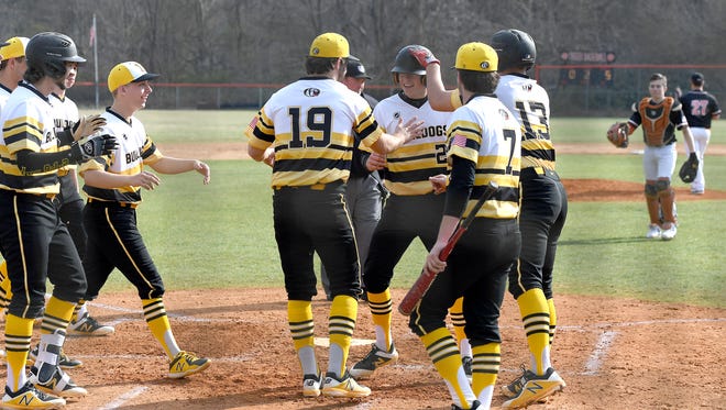 Rosman hosted Murphy on Friday, March 16, 2018. The Bulldogs defeated the Tigers 18-3 in five innings. 