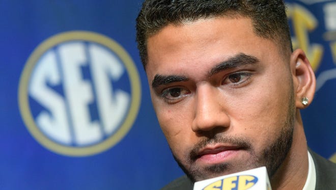 Ole Miss quarterback Jordan Ta'amu is interviewed during NCAA college football Southeastern Conference media days at the College Football Hall of Fame in Atlanta, Tuesday, July 17, 2018. (AP Photo/John Amis)