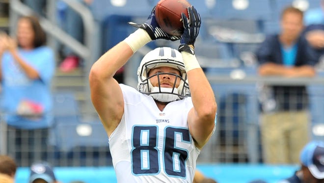 Titans tight end Chase Coffman catches a pass before Tennessee's game against Jacksonville in Oct. 12.