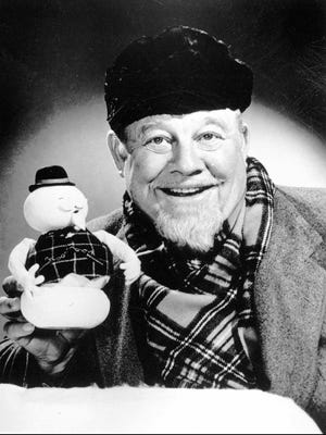 Burl Ives is shown in a 1977 file photo telling the story of "Rudolph the Red-Nosed Reindeer." Ives voiced Sam the Snowman and sang "A Holly Jolly Christmas" in the classic TV special.