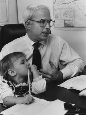 Sen. John McCain, R-Ariz., holds daughter Meghan McCain in his lap in 1987.