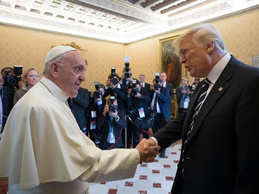 Pope Francis greets Trump at the Vatican on May 24,