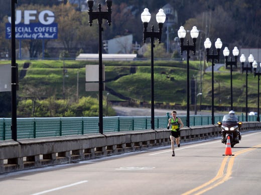 Bryan Morseman cross Gay St. Bridge in the final leg