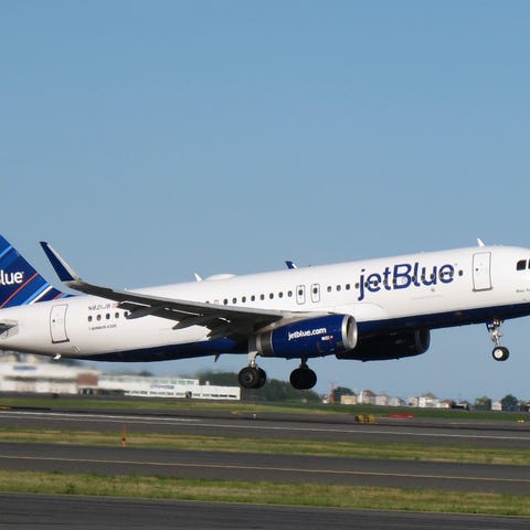 A JetBlue Airways plane preparing to land.