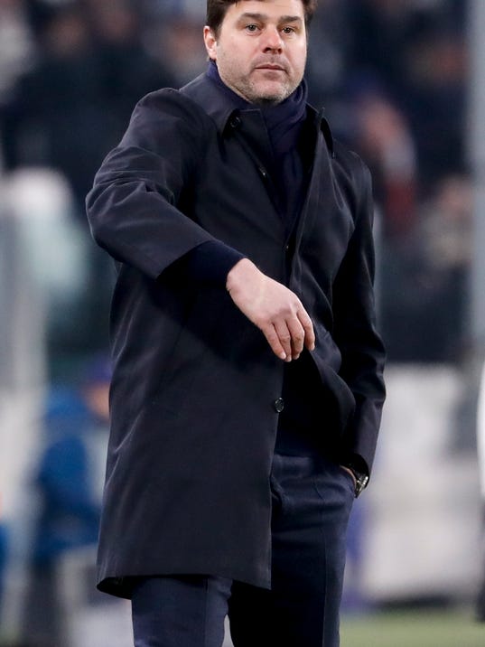 Tottenham coach Mauricio Pochettino follows the Champions League, round of 16, first-leg soccer match between Juventus and Tottenham Hotspurs, at the Allianz Stadium in Turin, Italy, Tuesday, Feb. 13, 2018. (AP Photo/Antonio Calanni)