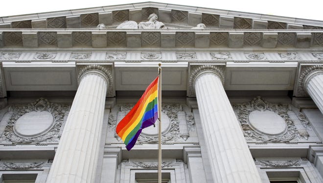 Pride flag at city hall.