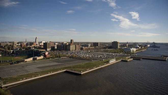 Seen from the Benjamin Franklin Bridge, the Camden Waterfront stretches along the Delaware River.