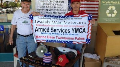 This Desert Sun file photo shows World War II veteran Harvey Kasner and Korean War veteran Jerry Geisler collecting donations in Rancho Mirage last year. They were collecting donations on Monday when someone stole their jar of contributions.