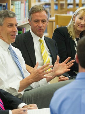United States Department of Education Secretary Arne Duncan, second from left, talks about technology in education during a Round Table discussion at West High School Wednesday April 3, 2013. With Duncan are Knox County Schools superintendent Dr. Jim McIntyre, left, Tennessee Governor Bill Haslam, and West High School Principal Katherine Banner.