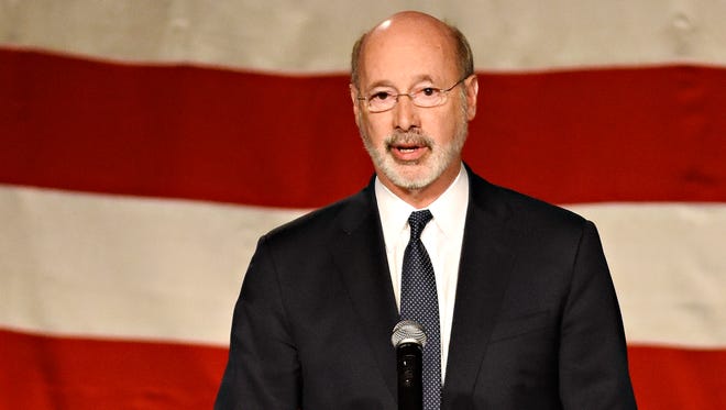 Democratic Gov. Tom Wolf signed a bill last year that authorized sports books at Pennsylvania's casinos along with mobile and online sports betting.  DISPATCH FILE PHOTO