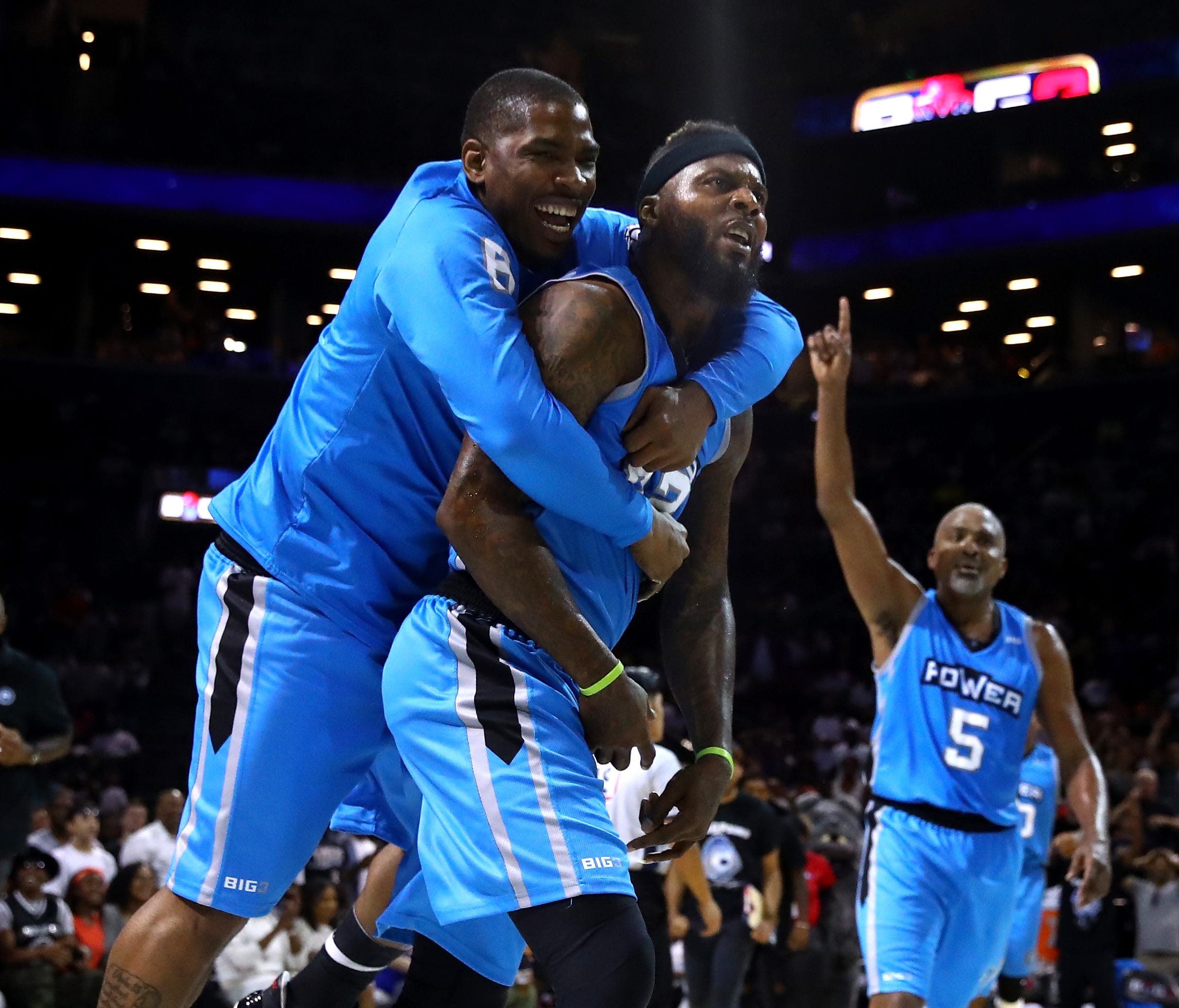 Deshawn Stevenson of Power celebrates with teammates after defeating Tri-State during week one of the BIG3 basketball league at Barclays Center.