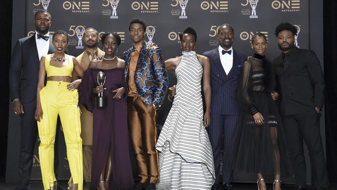 The cast of "Black Panther" pose in the press room with the award for outstanding motion picture at the 50th annual NAACP Image Awards on Saturday, March 30, 2019, at the Dolby Theatre in Los Angeles. “Black Panther” also won best actor (Chadwick Boseman), supporting actor (Michael B. Jordan) and directing  (Ryan Coogler).
