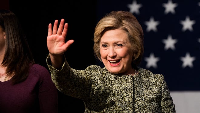 Hillary Clinton waves during an event on gun violence in Port Washington, N.Y., on April 11, 2016.