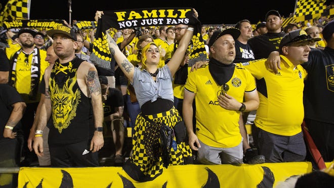 Columbus fans cheer after a Crew game at Mapfre Stadium last August. Under Gov. Mike DeWine's new order on limited number of fans being allowed at sporting events, the Crew would have just 1,500 fans at games.