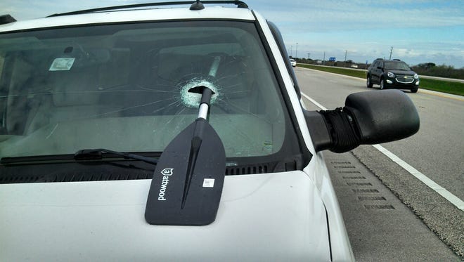 An oar smashed through the windshield of a driver on Alligator Alley Friday. The driver was unhurt.