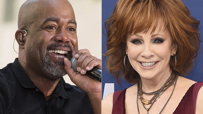 Darius Rucker, left, and Reba McEntire are hosts for the 54th Annnual CMA Awards, which air Wednesday on ABC.