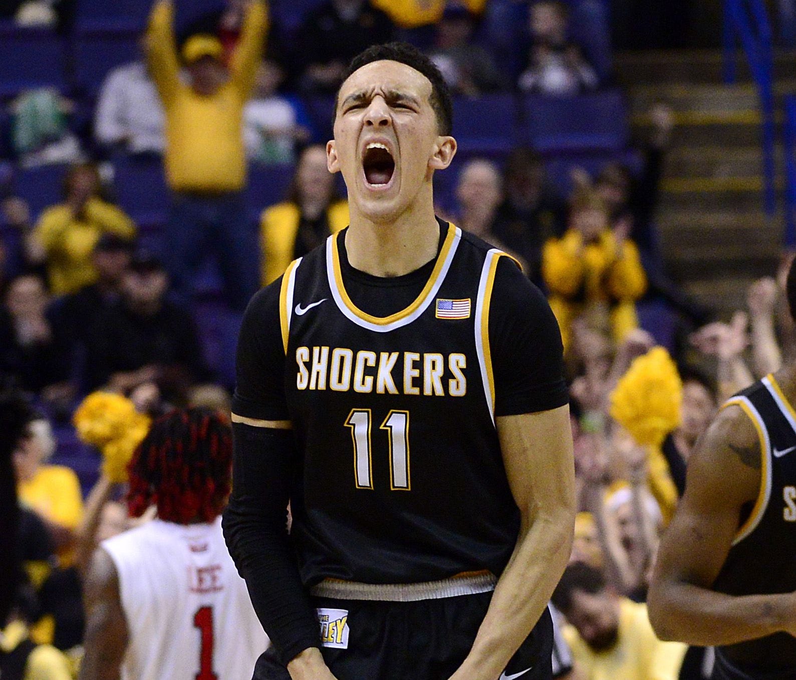 Wichita State Shockers guard Landry Shamet (11) celebrates after scoring against the Illinois State Redbirds during the second half of the Championship game of the Missouri Valley Conference Tournament at Scottrade Center. Wichita State won 71-51.