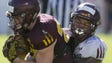 ASU running back Nick Ralston carries the ball as as