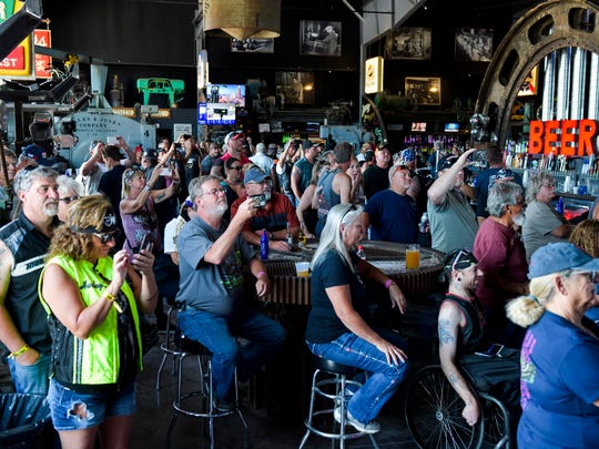 People watch a concert at the Full Throttle Saloon during the 80th Annual Sturgis Motorcycle Rally in Sturgis, S.D., on Aug. 9.