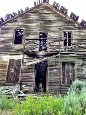 
A former boarding house is in ruins in Comet ghost town near Basin.

