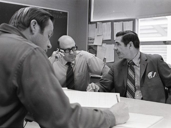 From left, Green Bay Packers receivers coach Bob Schnelker,