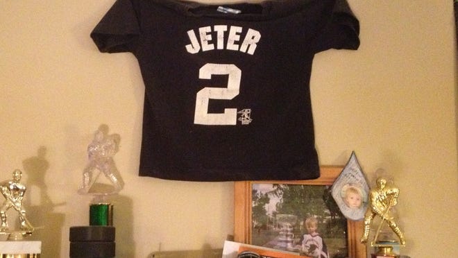 
Leo Roth’s son, Christian, received this Derek Jeter T-shirt for his third birthday. Christian is 13 now, but the shirt still hangs on his bedroom wall.
