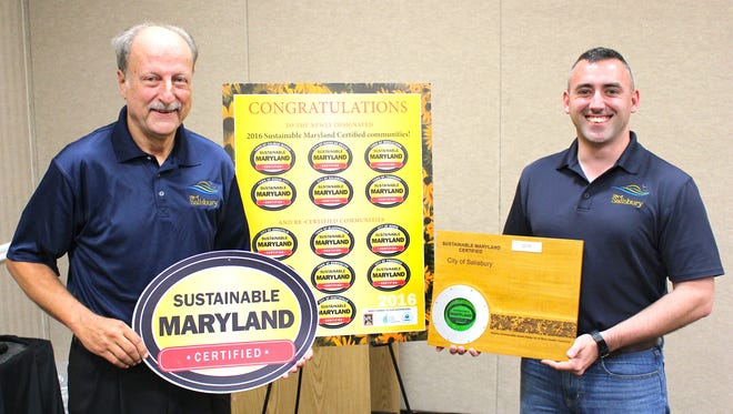Salisbury City Council President Jack Heath, left, and Mayor Jake Day pose during the Sustainable Maryland Awards Ceremony,