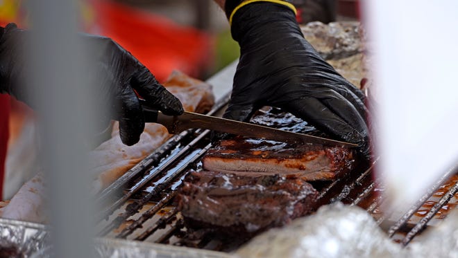Ribs getting ready for judging during a past Smokin' in the Square. This year's event take place Friday through Sunday in Seville Square.