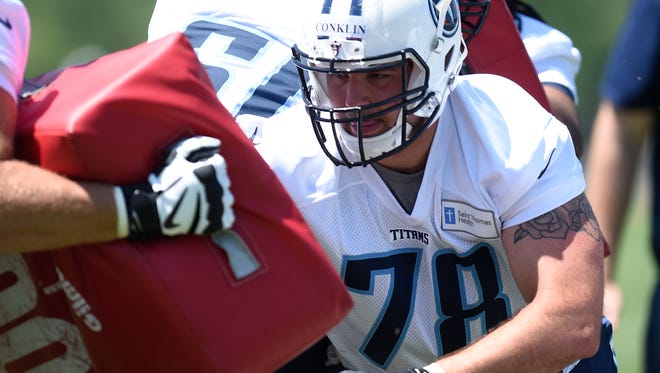 Titans offensive lineman Jack Conklin (78) powers through a drill during rookie practice May 12.