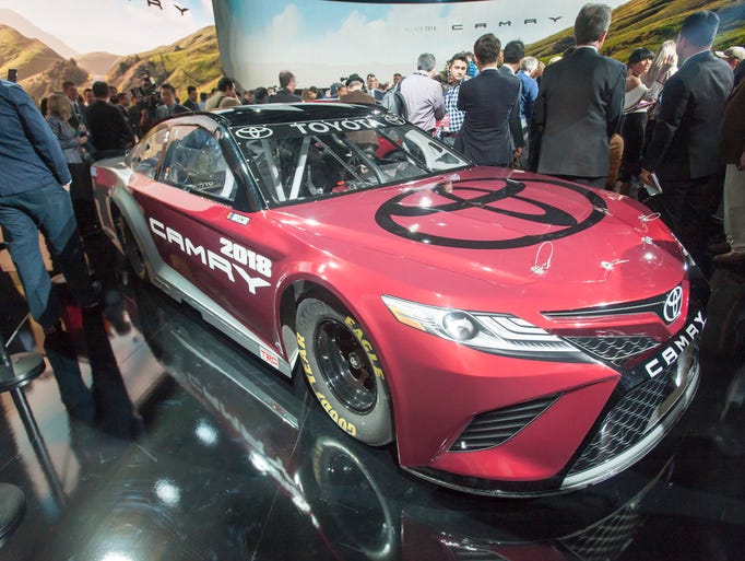 The 2018 Toyota NASCAR Camry is displayed.