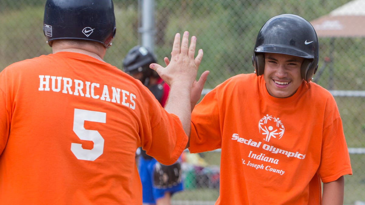 Special olympics softball throw