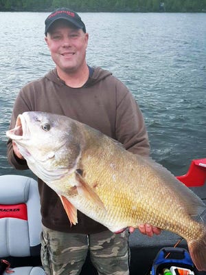 New York state resident Joseph Whalen Jr. holds the new Vermont state record freshwater drum he caught while fishing on Lake Champlain in September of 2016. The fish weighed 25.54 pounds and measured 34.5 inches in length.
